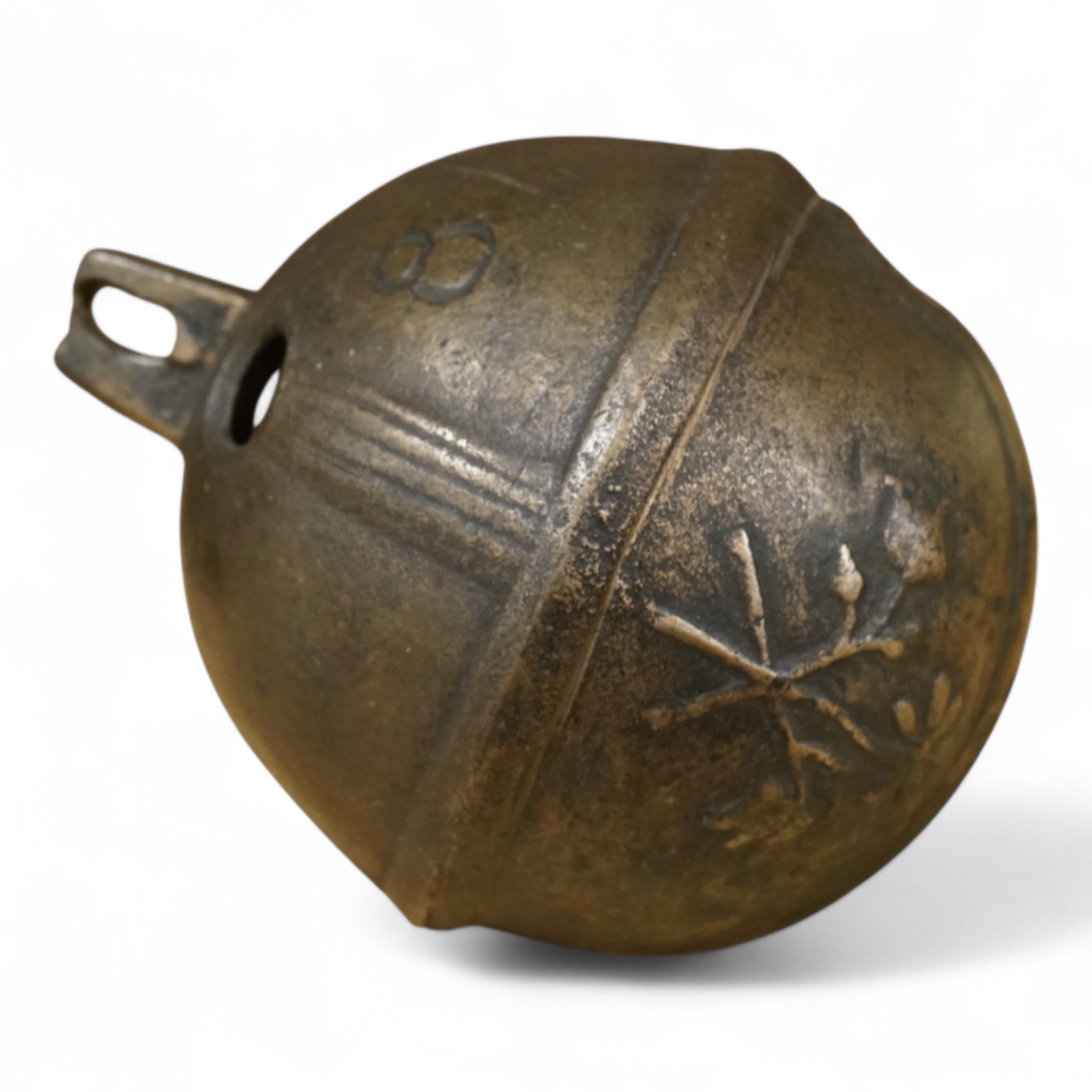 A 19th century livestock crotal bell engraved 8 1/2, 12cm wide